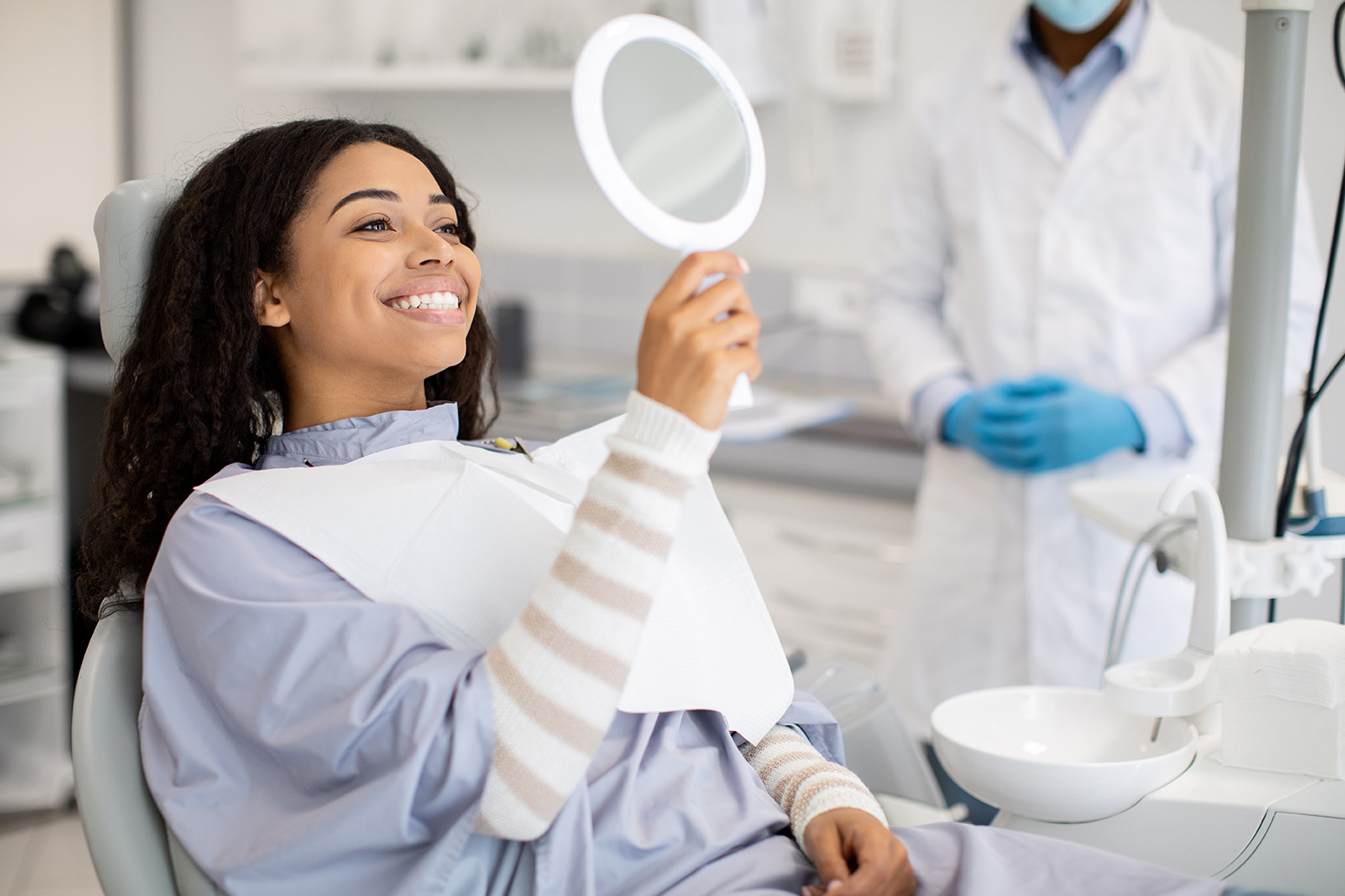 dental patient smiling during relaxed dental visit at jensen family dental